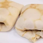 Puchate naleśniki z serem i rodzynkami